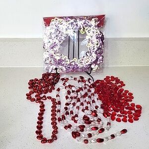 Bundle of Garlands and a heart necklace.